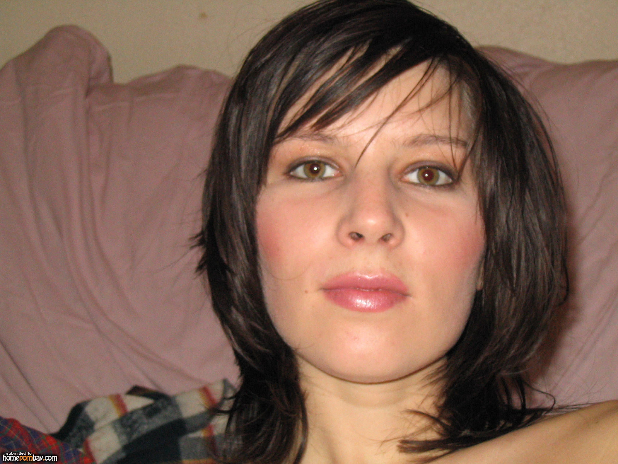 Black Haired Teen Strips For The Camera