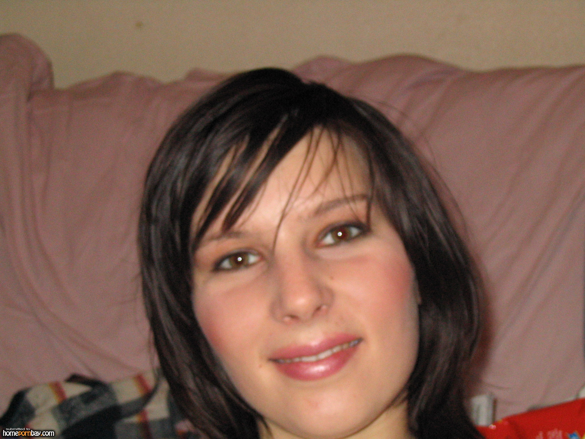 Black Haired Teen Strips For The Camera