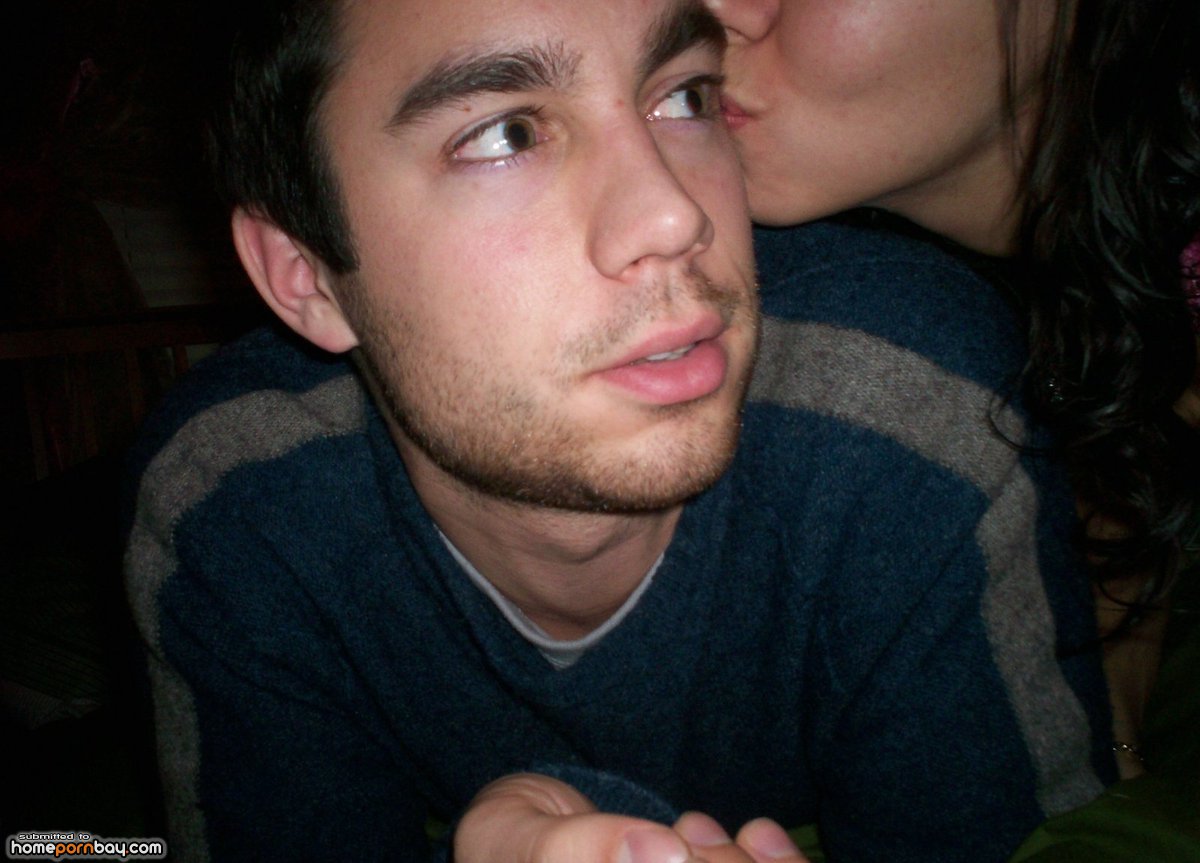 Smiling and gagging on a cock